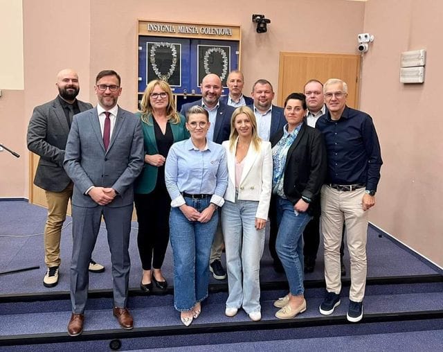 a group of people posing for a photo