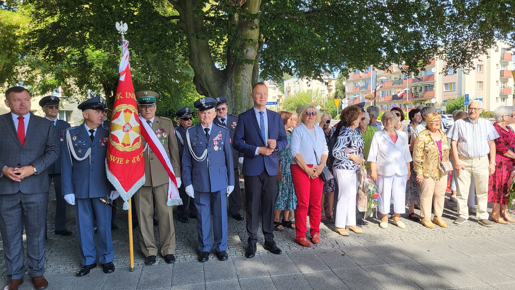 a group of people standing in a line